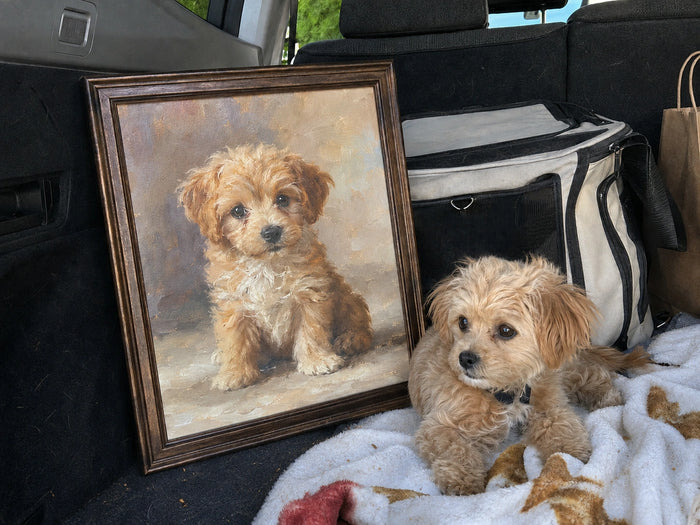 Mia holding Biscuit's finished welcome portrait